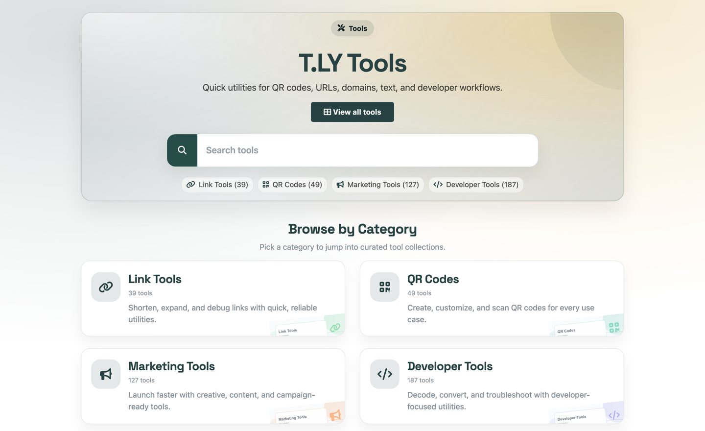 T.LY Tools homepage on the t.ly domain showing search, tool categories, and cards for Link Tools, QR Codes, Marketing Tools, and Developer Tools.